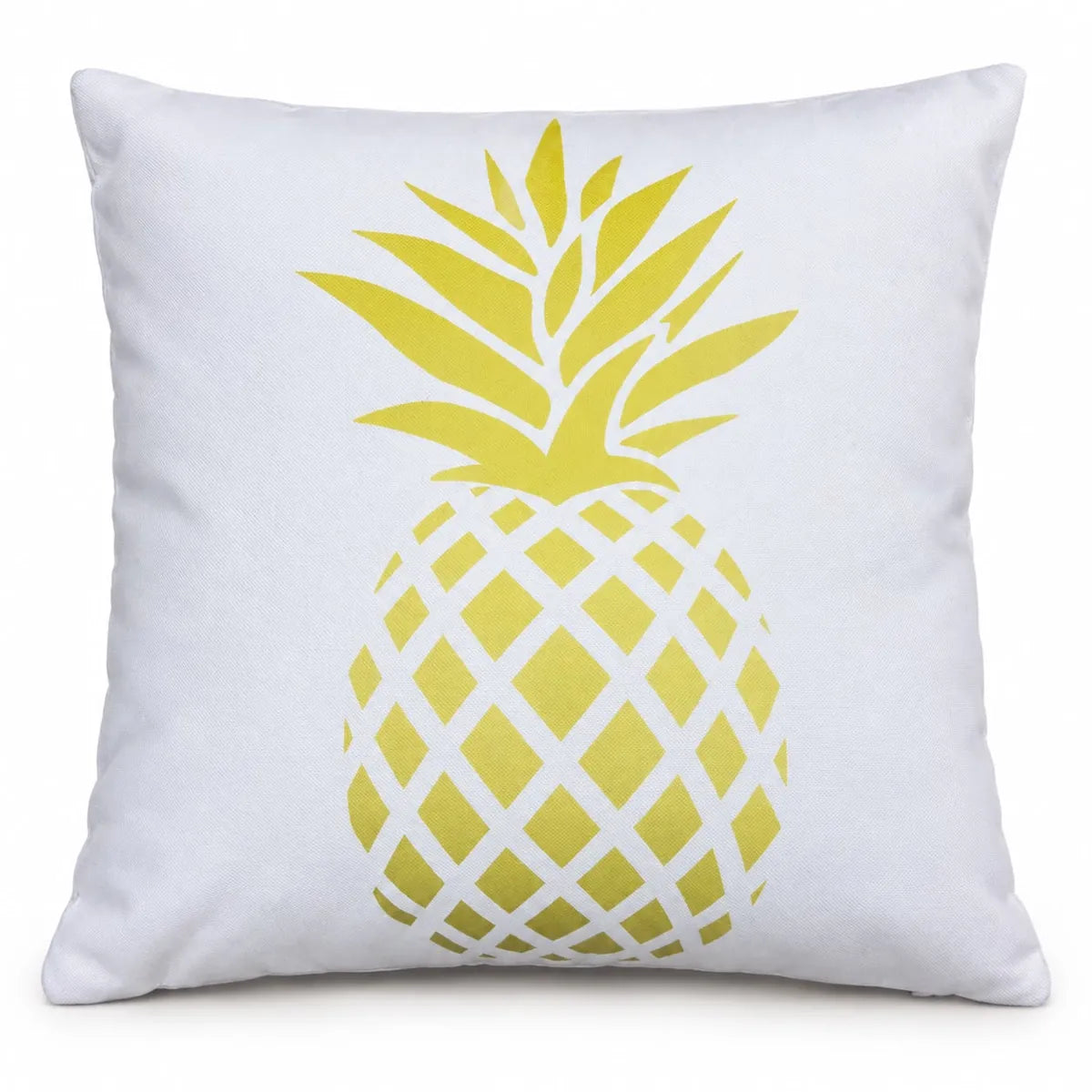 Față de pernă decorativă cu ananas galben pe fond alb pe canapea